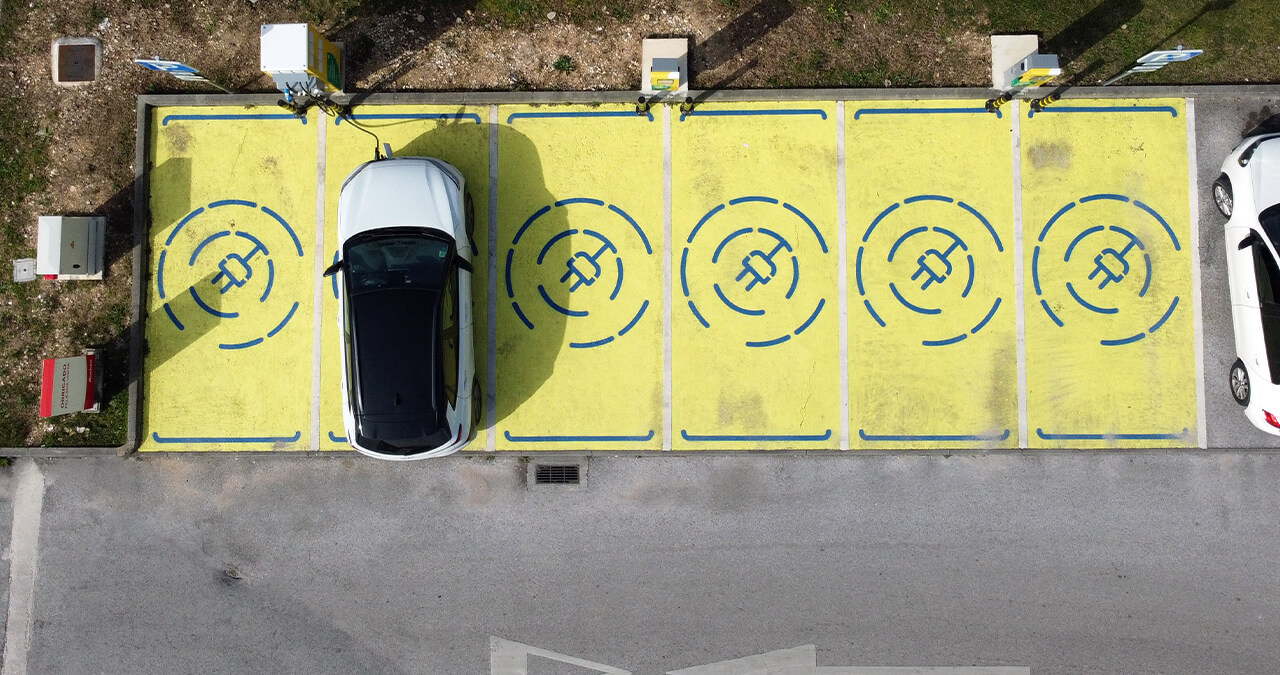 aerial view of the electric vehicle chargers at auchan eiras